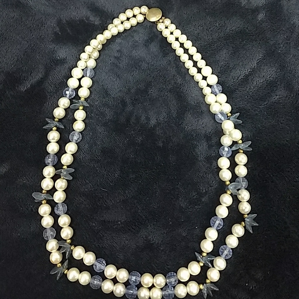 White pearl with blue beaded necklace.